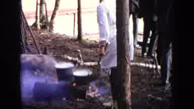 Moscow Russia (1971): Several People Standing In The Forest With A Fire And Pots