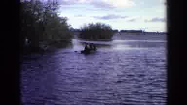 Moscow Russia (1971): People Riding In Rowboat On Lake On A Clear Day