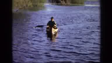 Moscow Russia (1971): Fancy Dressed Elderly Men Rowing Canoes Laughing Filmed On