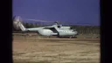 Moscow Russia (1971): Chopper Stays Stationary On The Dirt Right Before The Pilot