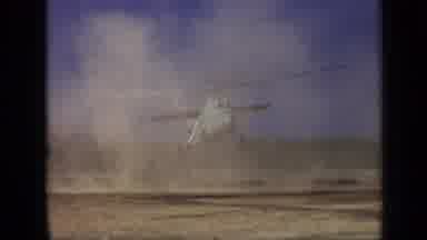 Moscow Russia (1971): Helicopter Hovering Several Meters Above A Field Kicks Up