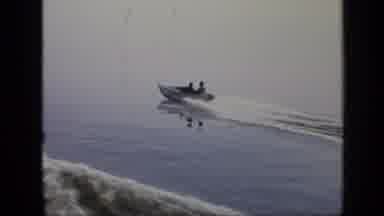 Moscow Russia (1971): Small Motorized Boat Driving Down The Lake