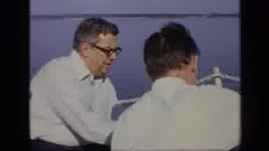 Moscow Russia (1971): Men In White Shirts Sit By Lake Drinking Then Man Looks To