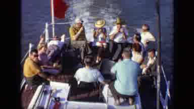 Moscow Russia (1971): Group Of People Sitting On The Back Of A Boat Driving