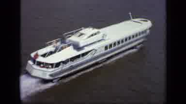 Moscow Russia (1971): A Yacht Riding Through The Canal Of A City During The Day