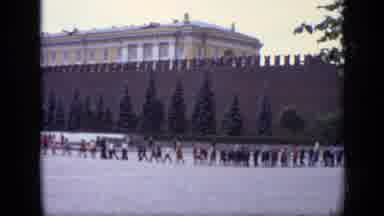 Moscow Russia (1971): People Walking In Line Across Courtyard On A Clear Day
