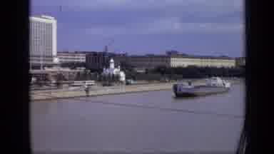 Moscow Russia (1971): Man Using A Yellow High Lift Bucket To Push Large Amount Of