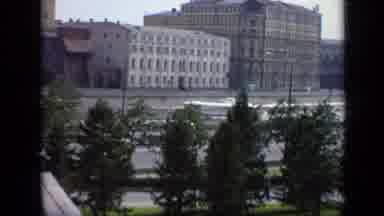 Moscow Russia (1971): Speedboat Races Up Waterway Then Pulls Away At Same Speed