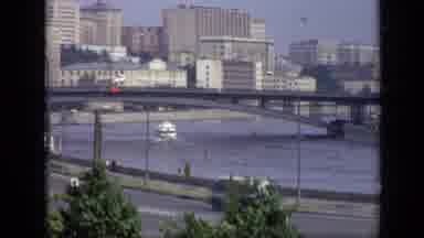 Moscow Russia (1971): A Highway With Traffic Overlooking A Channel With A Boat