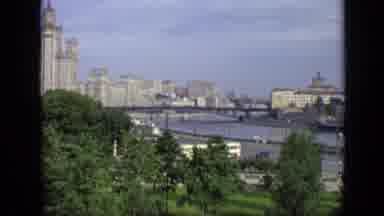 Moscow Russia (1971): View Of Green Trees White Buildings And Traffic On A Clear