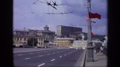 Moscow Russia (1971): Urban City Streets With Oncoming Traffic And A Brisk Wind