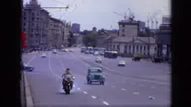 Moscow Russia (1971): Cars And Traffic Driving Down A Large 4 Lane Road