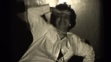 Illinois USA (1947): Woman Laughing With A Pillow In Her Dress Letting Her Wiggle