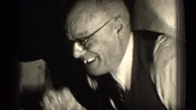Illinois USA (1947): Dog Wearing A Harness Runs Around The Room As Man Laughs And