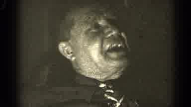 Illinois USA (1947): Elderly Man In Dress Shirt And Tie Talking And Laughing To