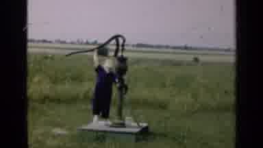 Illinois USA (1947): Two Videos First Of Boy Standing At Water Pump And Pulling It
