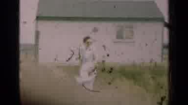 Illinois USA (1947): Man Tilling The Land Gets Interrupted By His Wife Outside