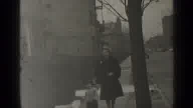 New York (1947): Black And White Image Looks Like A Dad Mom And Son Relaxing