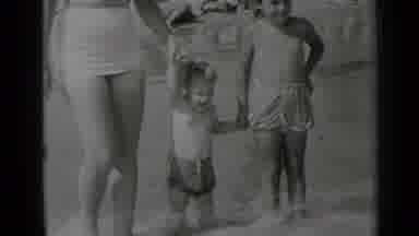 New York (1947): Mother And Two Children Spending Time At The Beach In Black And