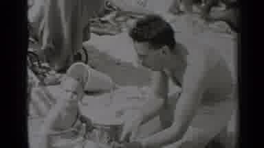 New York (1947): The People Looks Like Father And Son Are Making A Sand Castle