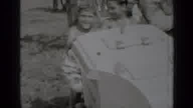 New York (1947): Archive Footage Little Boy Paddling And Then Climbing In To Water
