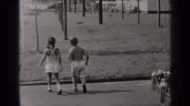 New York (1947): Two Kids Skipping Across Street In A Bright Sunny Day