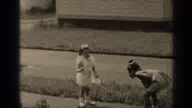 New York (1947): Children Roll The Ball Back And Forth In Front Of Car In