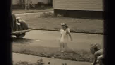 New York (1947): Kids Playing With A Ball In Front Of Their Houses Near An Old Car