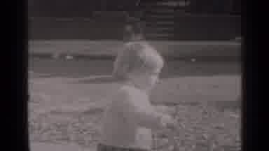 New York (1947): Child Shakily Walking In Park With Other Child Rollerblading On