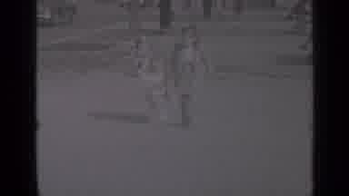 New York (1947): A Big And Little Sister Prance Together Holding Hands In The