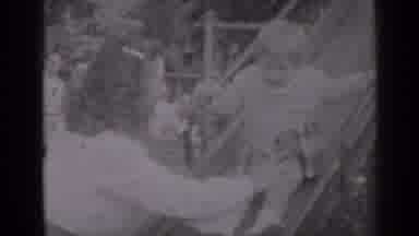 New York (1947): Old Footage Of A Mother Helping Her Child Down A Slide