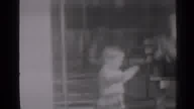 New York (1947): A Young Female Toddler In A Sweater In Skirt Walks Quickly To An