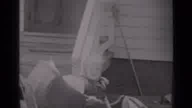 New York (1947): An Adult And Two Children Playing Together Outside The House
