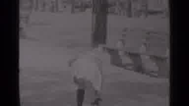 New York (1947): Girl Bending Down Picking Up Something And Turns Around To Look