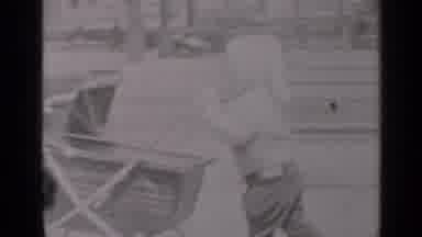 New York (1947): Very Old And Distorted Footage Of Two Young Children Pushing A