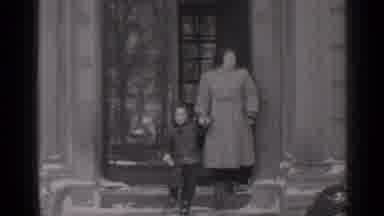 New York (1947): Mother Holds Child's Hand As They Walk Outside Together Into The