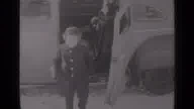 New York (1947): Man And Child Wearing Grey Coats Get Out If Black Car On A Sunny