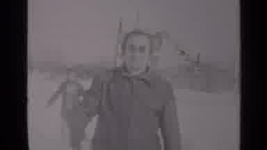 New York (1947): Man In Snow Gear Happily Walks Forward Through Snow Swept Street