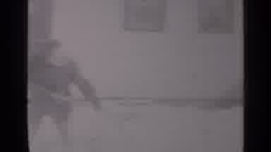 New York (1947): Man Throws Shovel Full Of Snow Towards Woman; Woman Walks Picks