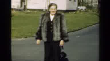 New York (1947): Woman Leaving Her Residence Very Well Wrapped Up In Winter Day