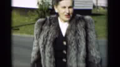New York (1947): Woman Wearing Fur Coat And Man Walking Towards The Camera Smiling