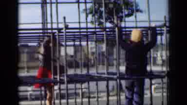 New York (1947): Boy And Girl Climb On The Money Bars At The Playground Together