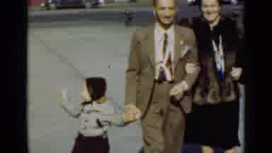 New York (1947): Man Woman And Child Walk Down The Sidewalk Smiling And Enjoying