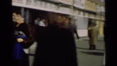 New York (1947): A Family Holding Hands Walks Down A Busy Boardwalk In The Winter