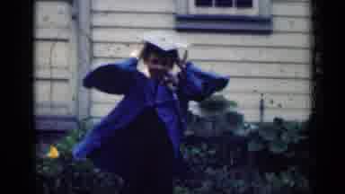 Indiana USA (1948): White Dog Running Towards Their Newly Graduated Owner