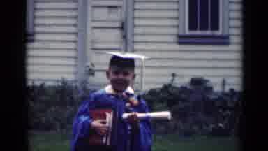 Indiana USA (1948): Young Boy Completes Kindergarten Grandpa Is Unsure How To Use