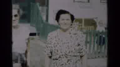 New York (1950): People Walk Past A Chinese Restaurant Building With Tall Red