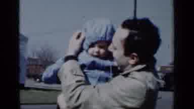New York (1950): Father Playing With His Little Child In Blue Kissing The Child On