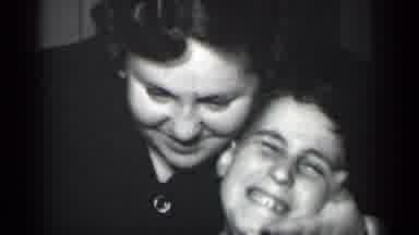 New York (1950): A Young Boy Kisses A Woman Who Has Gently Hugged His Face While