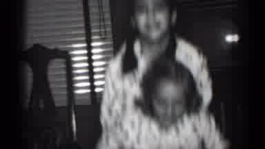 New York (1950): Two Girls Wearing Polkadot Pajamas Jump Near Television Set And